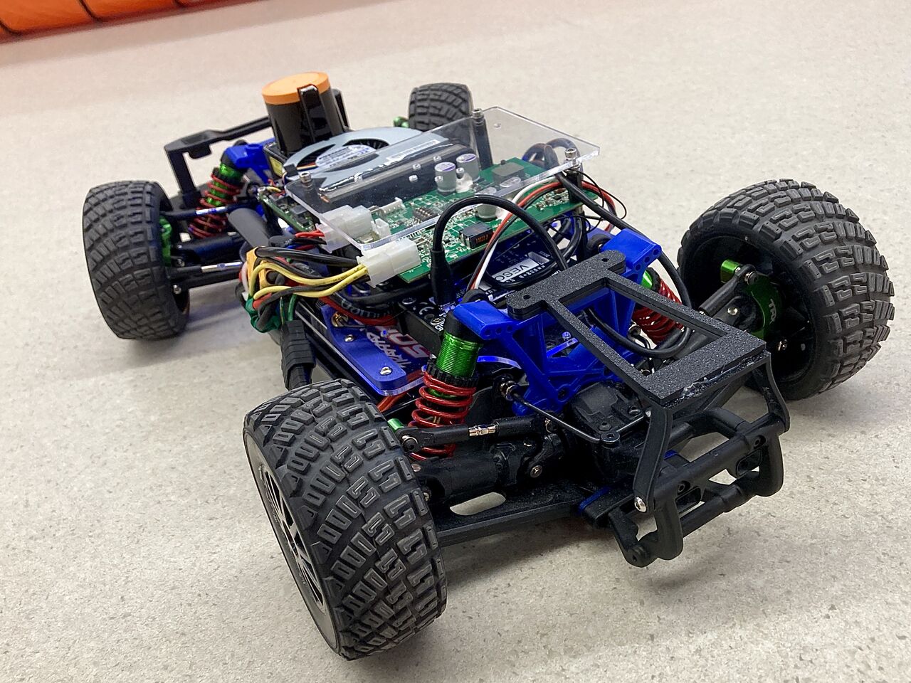 An RC Car outfitted with sensors and computers for autonomous racing.